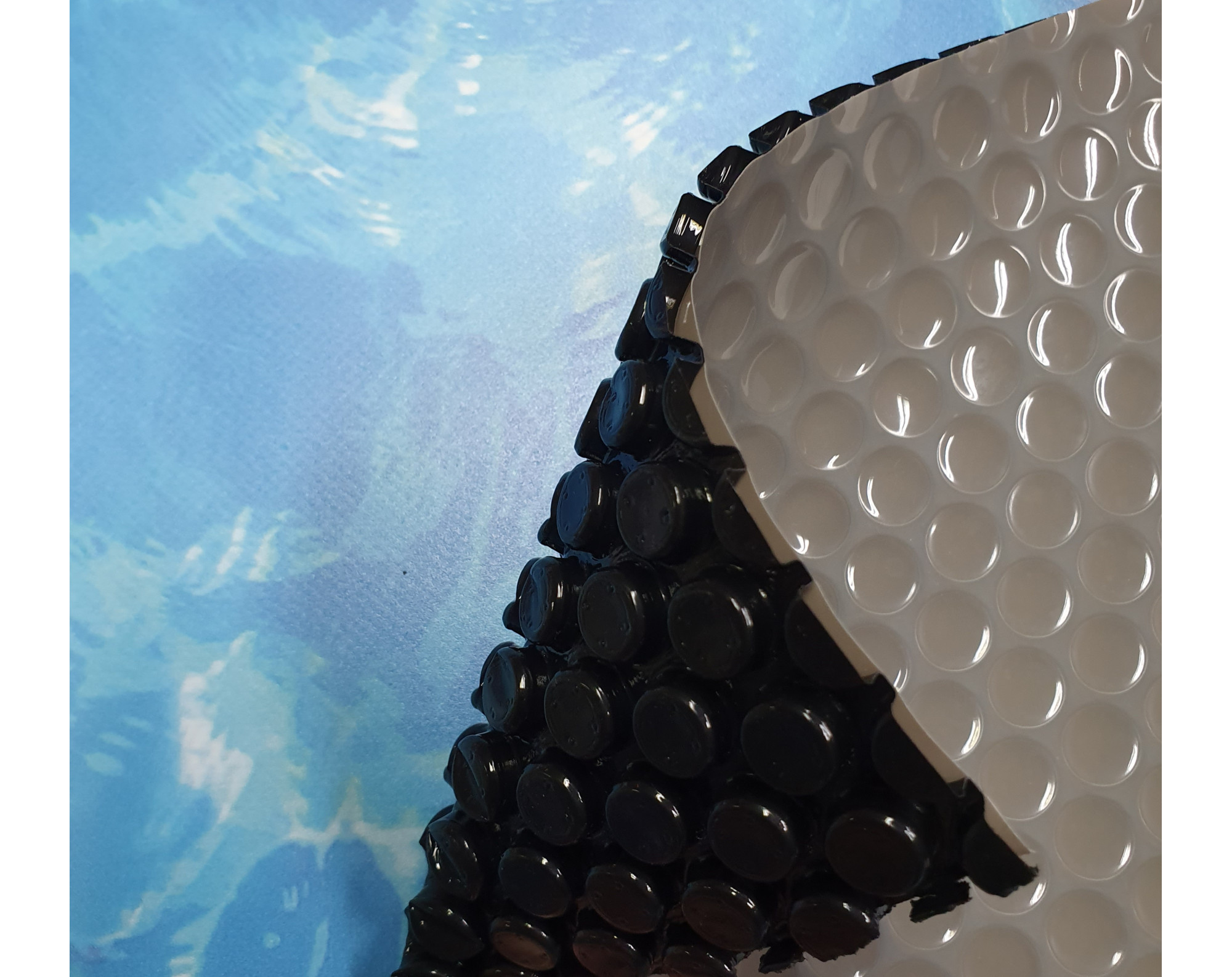 Cubierta de burbujas antialgas (gris-negro 400 micras) para piscina Intex XTR OVALE